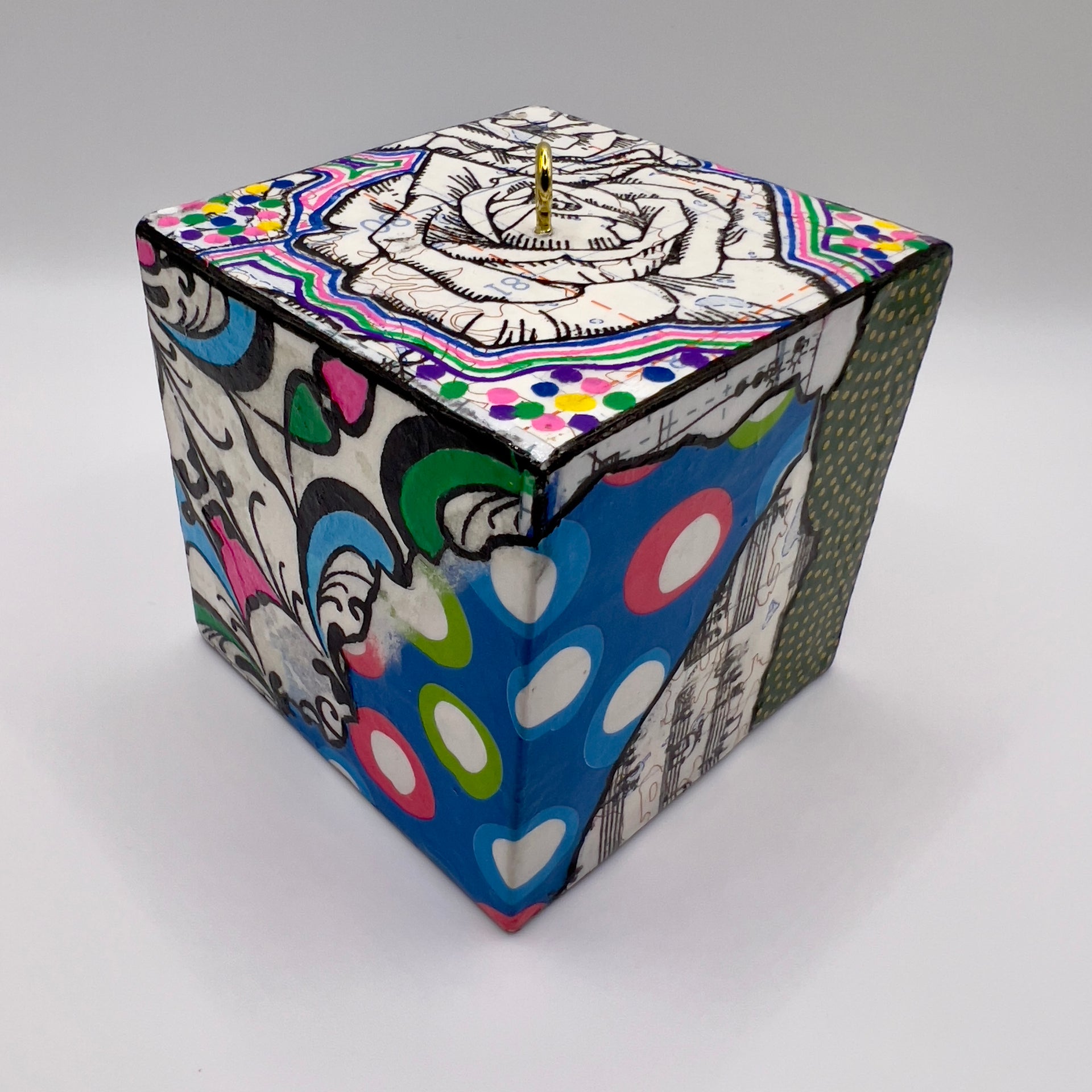 3-D CUBE ART #11 by Mary-Jo Lough, hand-painted 2.25” cube made from solid wood, featuring vibrant abstract art and layered details.