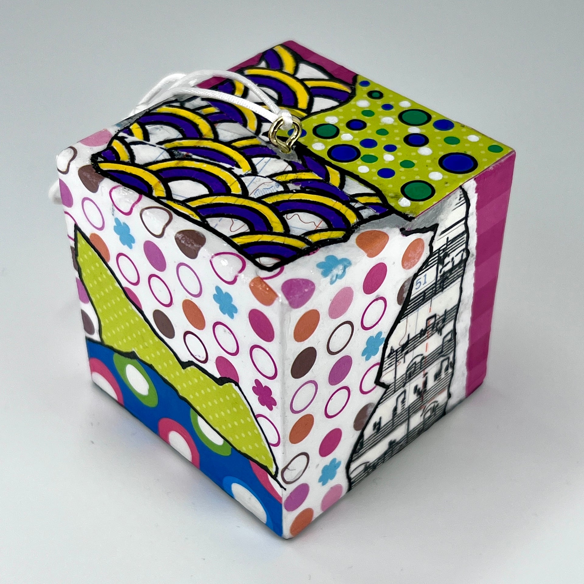 3-D CUBE ART #12 by Mary-Jo Lough, hand-painted 2.25” cube made from solid wood, featuring vibrant abstract art and layered details.