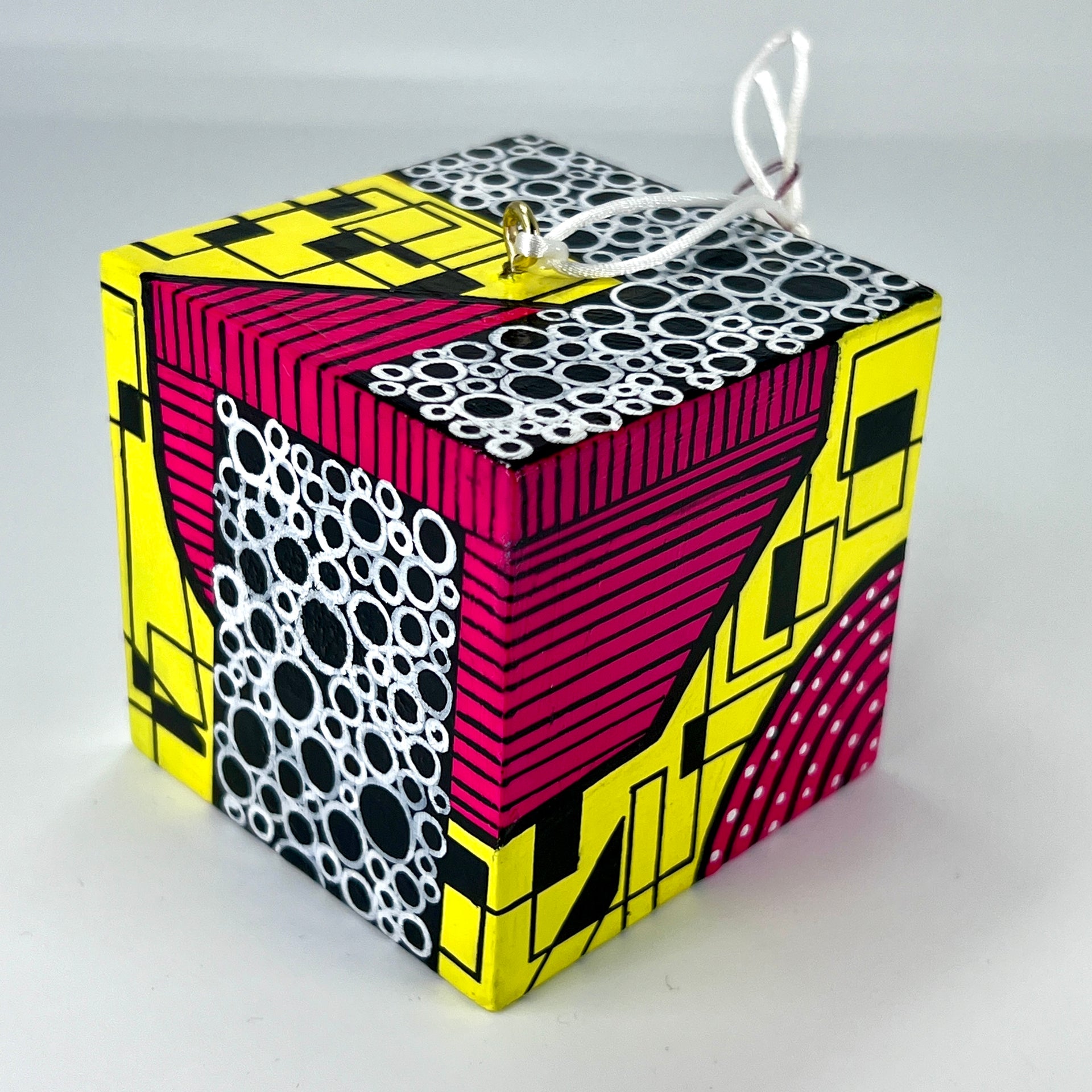 3-D CUBE ART #14 by Mary-Jo Lough, hand-painted 2.25” cube made from solid wood, featuring vibrant abstract art and layered details.