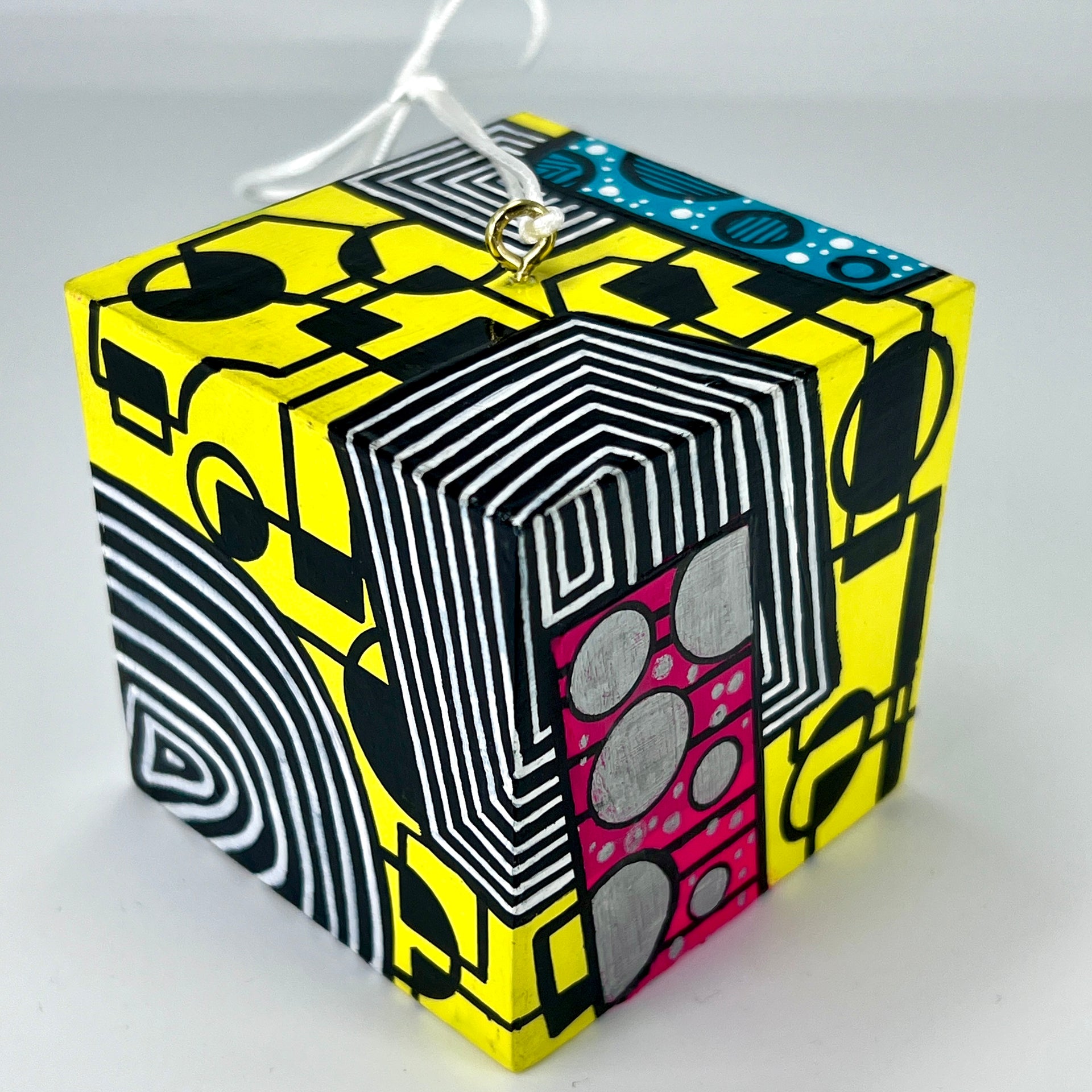 3-D CUBE ART #15 by Mary-Jo Lough, hand-painted 2.25” cube made from solid wood, featuring vibrant abstract art and layered details.