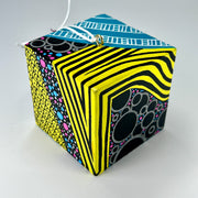 3-D CUBE ART #16 by Mary-Jo Lough, hand-painted 2.25” cube made from solid wood, featuring vibrant abstract art and layered details.