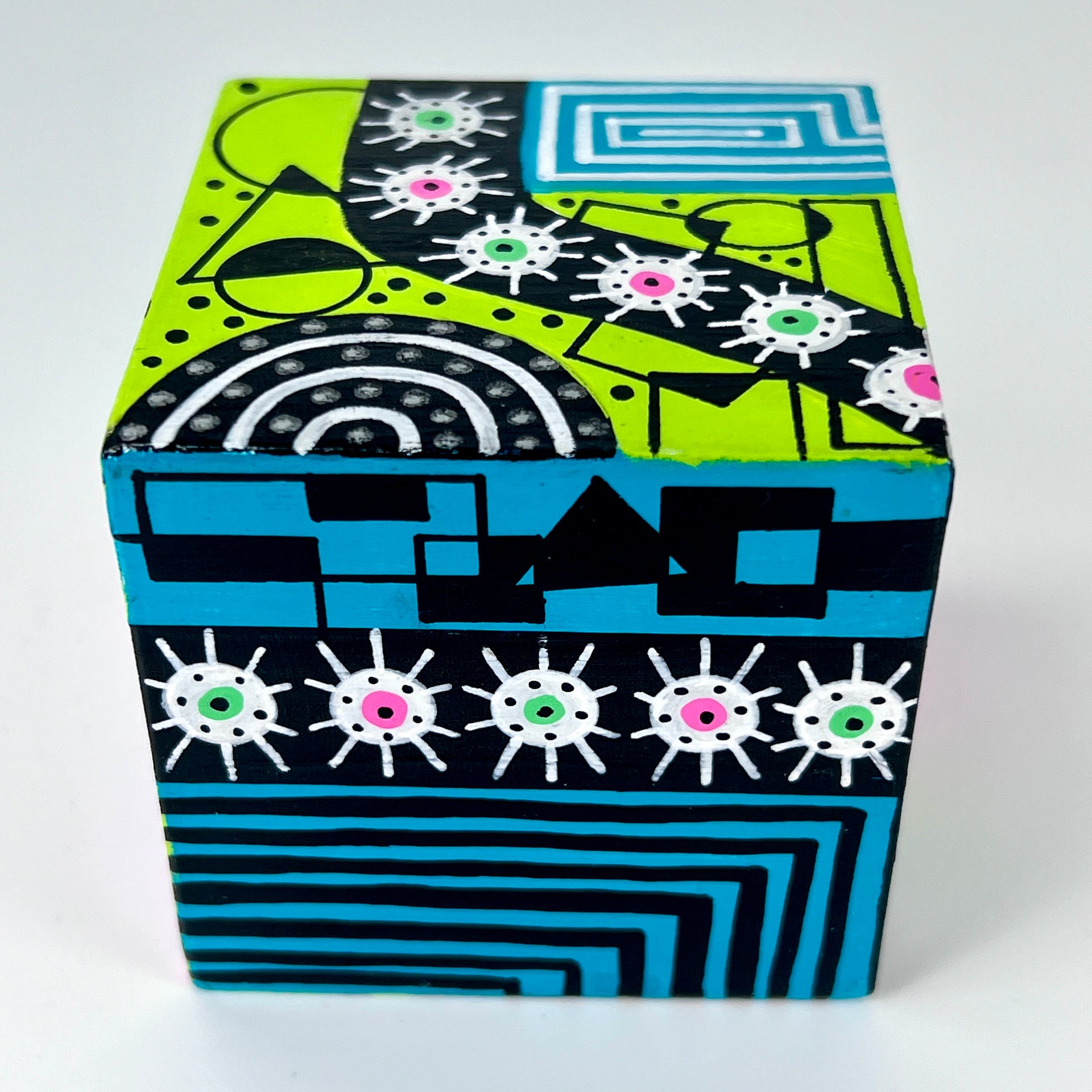 3-D CUBE ART #19 by Mary-Jo Lough, hand-painted 2.25” cube made from solid wood, featuring vibrant abstract art and layered details.