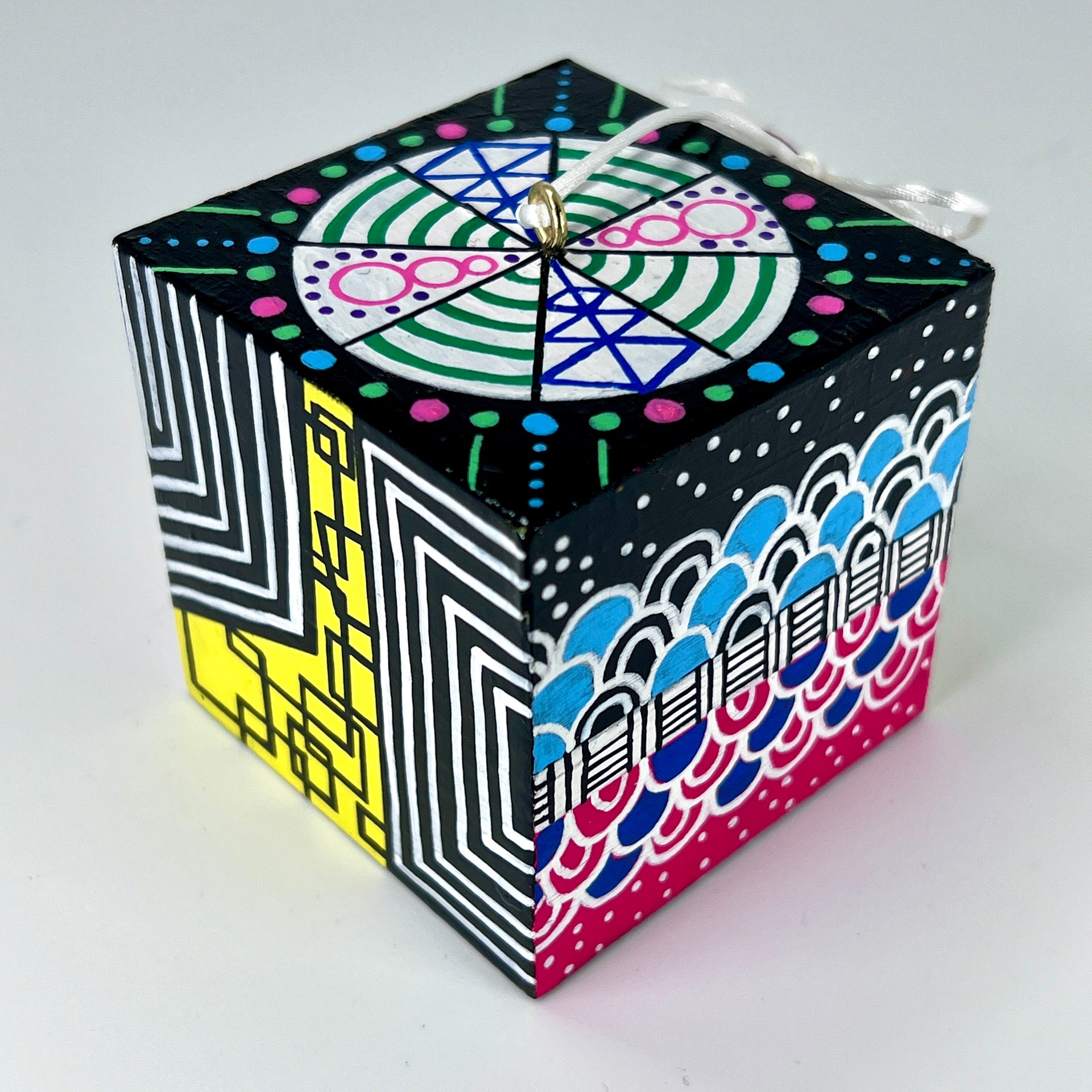 3-D CUBE ART #20 by Mary-Jo Lough, hand-painted 2.25” cube made from solid wood, featuring vibrant abstract art and layered details.