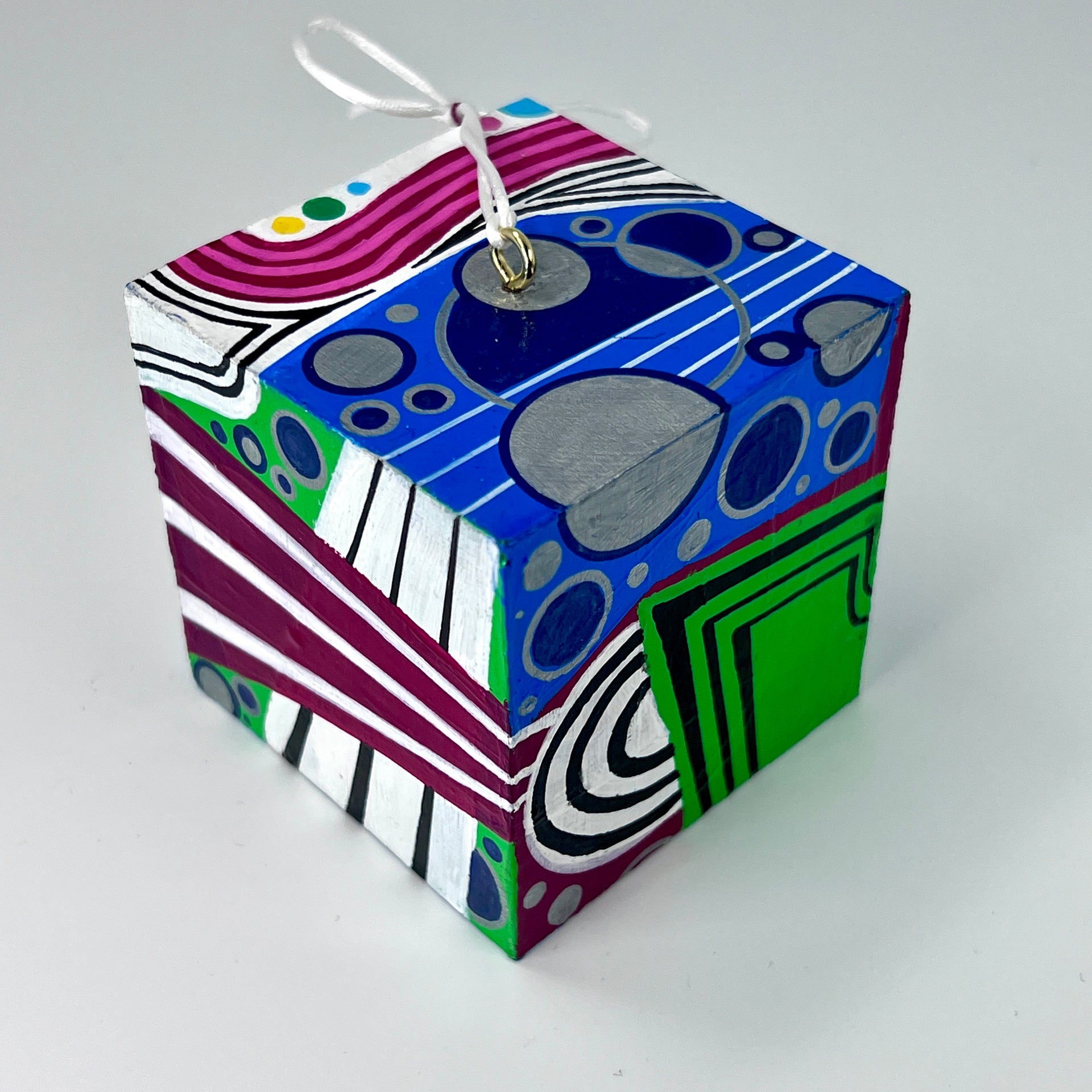 3-D CUBE ART #21 by Mary-Jo Lough, hand-painted 2.25” cube made from solid wood, featuring vibrant abstract art and layered details.