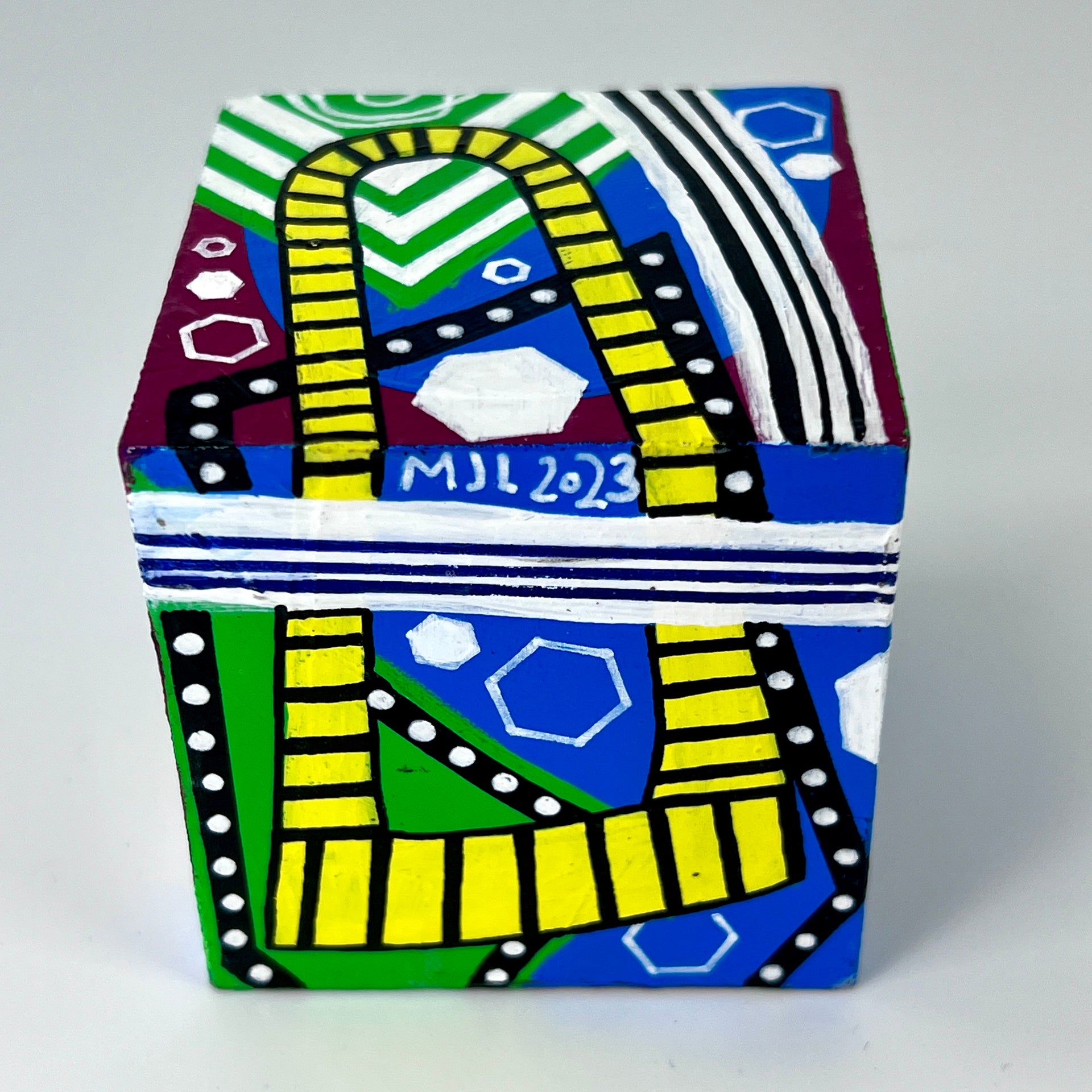 3-D CUBE ART #22 by Mary-Jo Lough, hand-painted 2.25” cube made from solid wood, featuring vibrant abstract art and layered details.