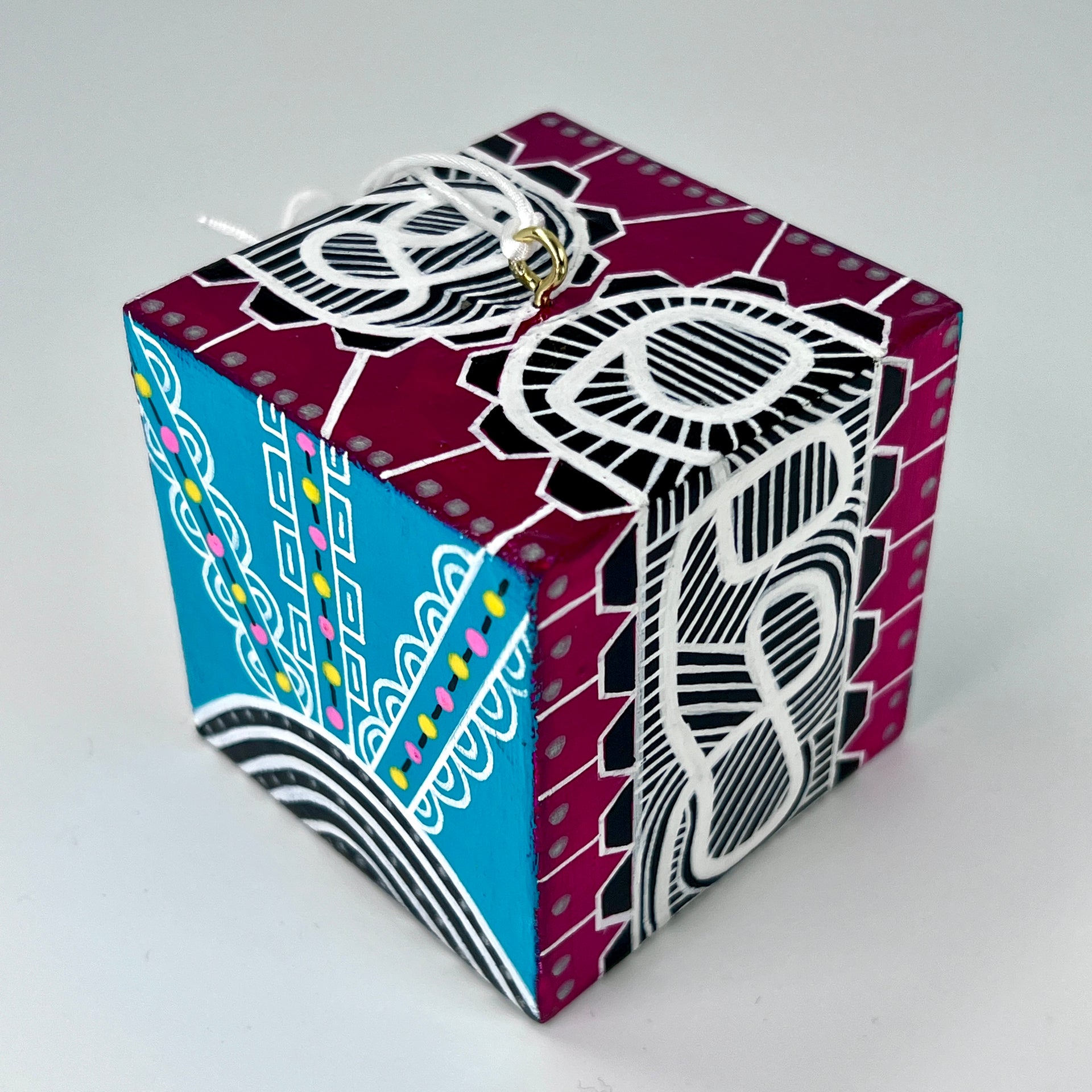 3-D CUBE ART #23 by Mary-Jo Lough, hand-painted 2.25” cube made from solid wood, featuring vibrant abstract art and layered details.