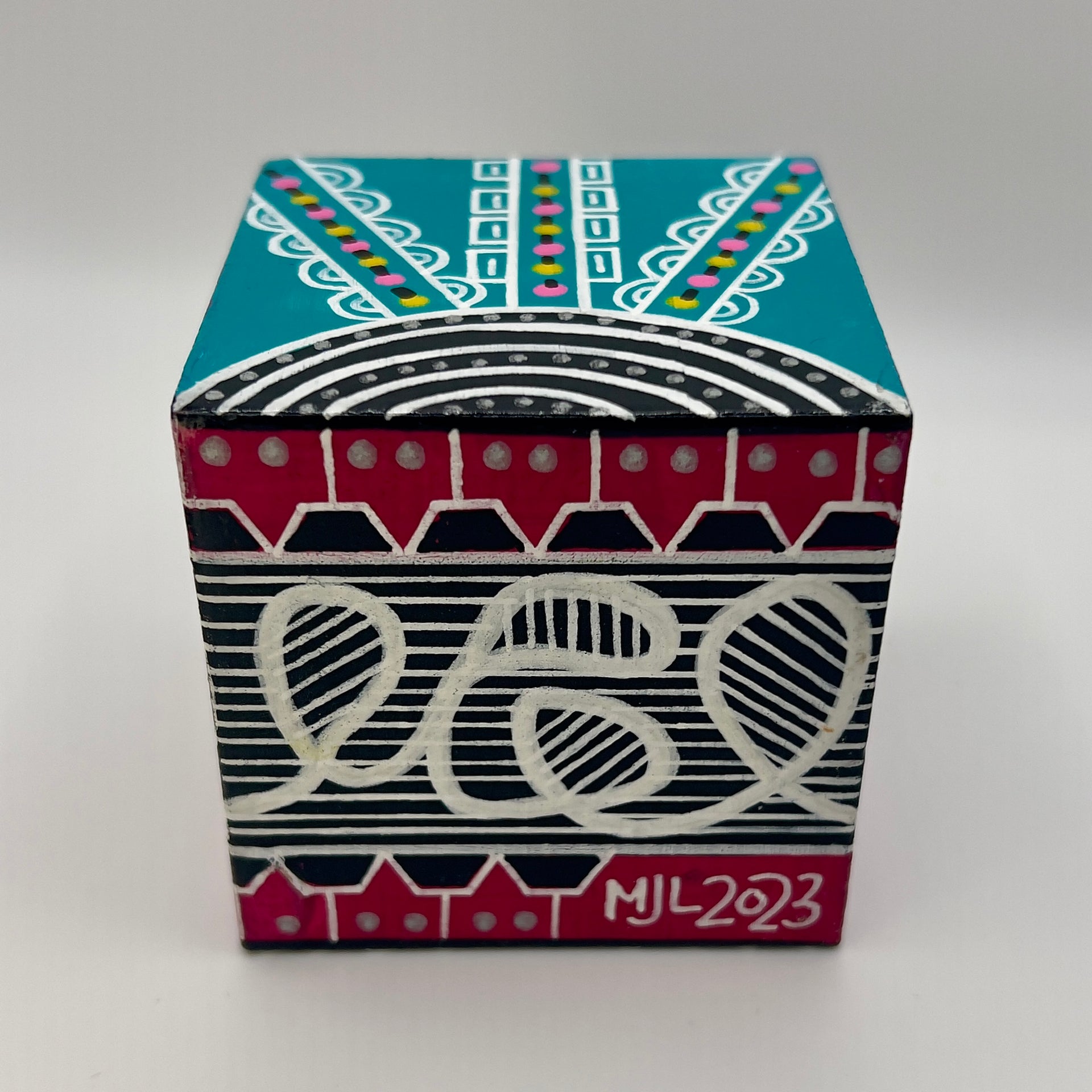 3-D CUBE ART #23 by Mary-Jo Lough, hand-painted 2.25” cube made from solid wood, featuring vibrant abstract art and layered details.