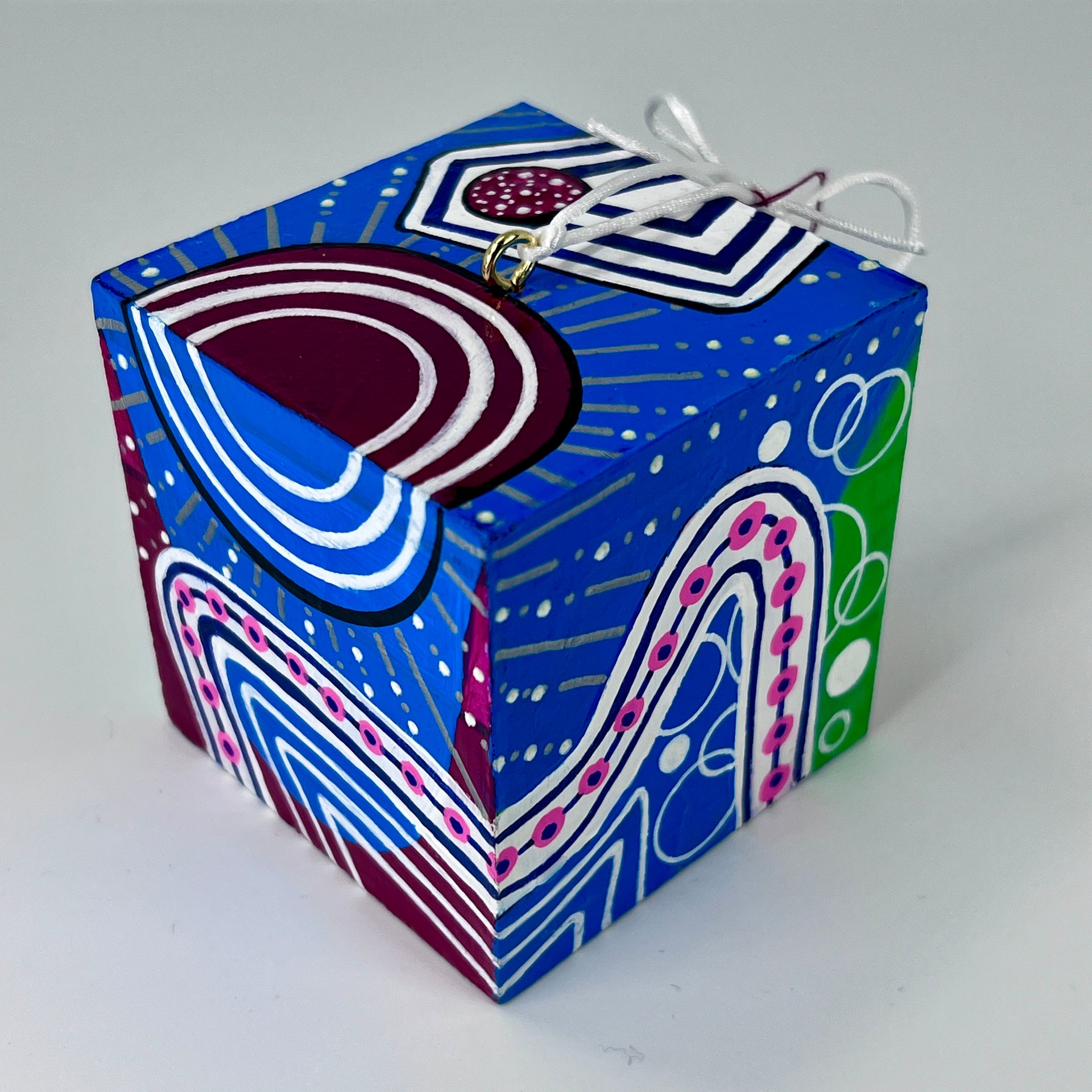 3-D CUBE ART #24 by Mary-Jo Lough, hand-painted 2.25” cube made from solid wood, featuring vibrant abstract art and layered details.