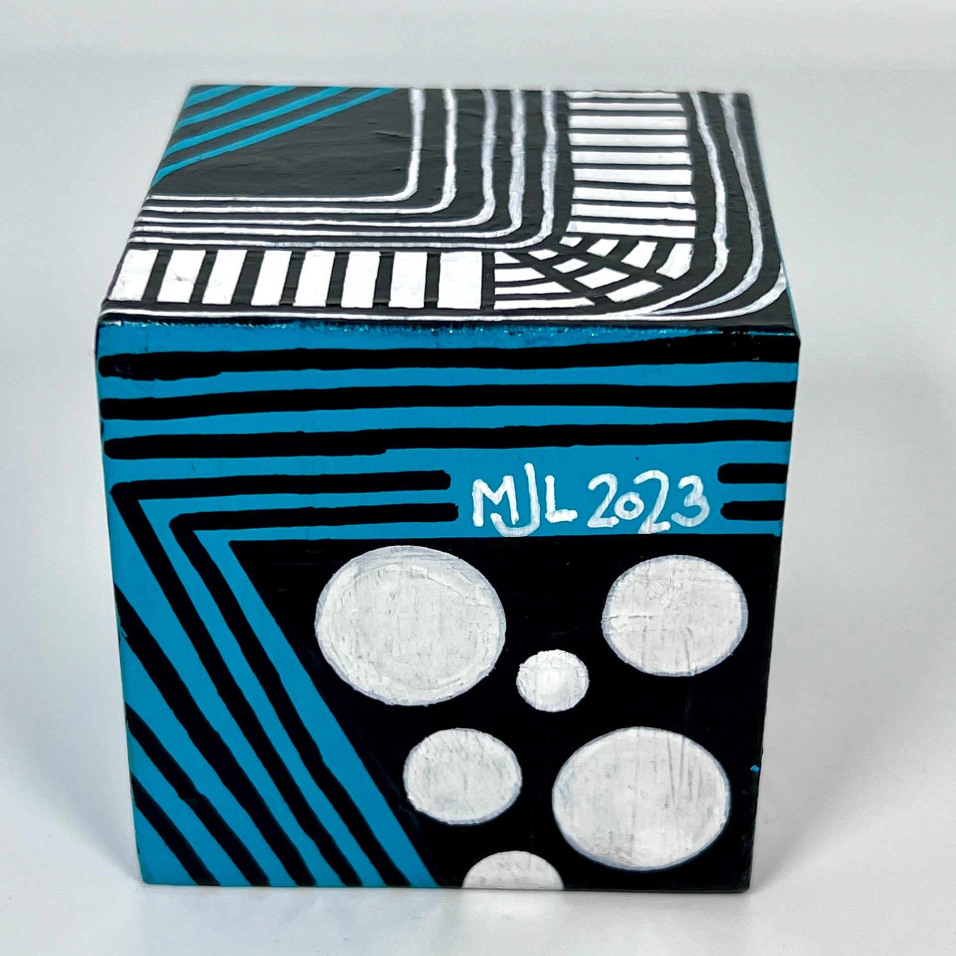 3-D CUBE ART #3 by Mary-Jo Lough, hand-painted 2.25” cube made from solid wood, featuring vibrant abstract art and layered details.