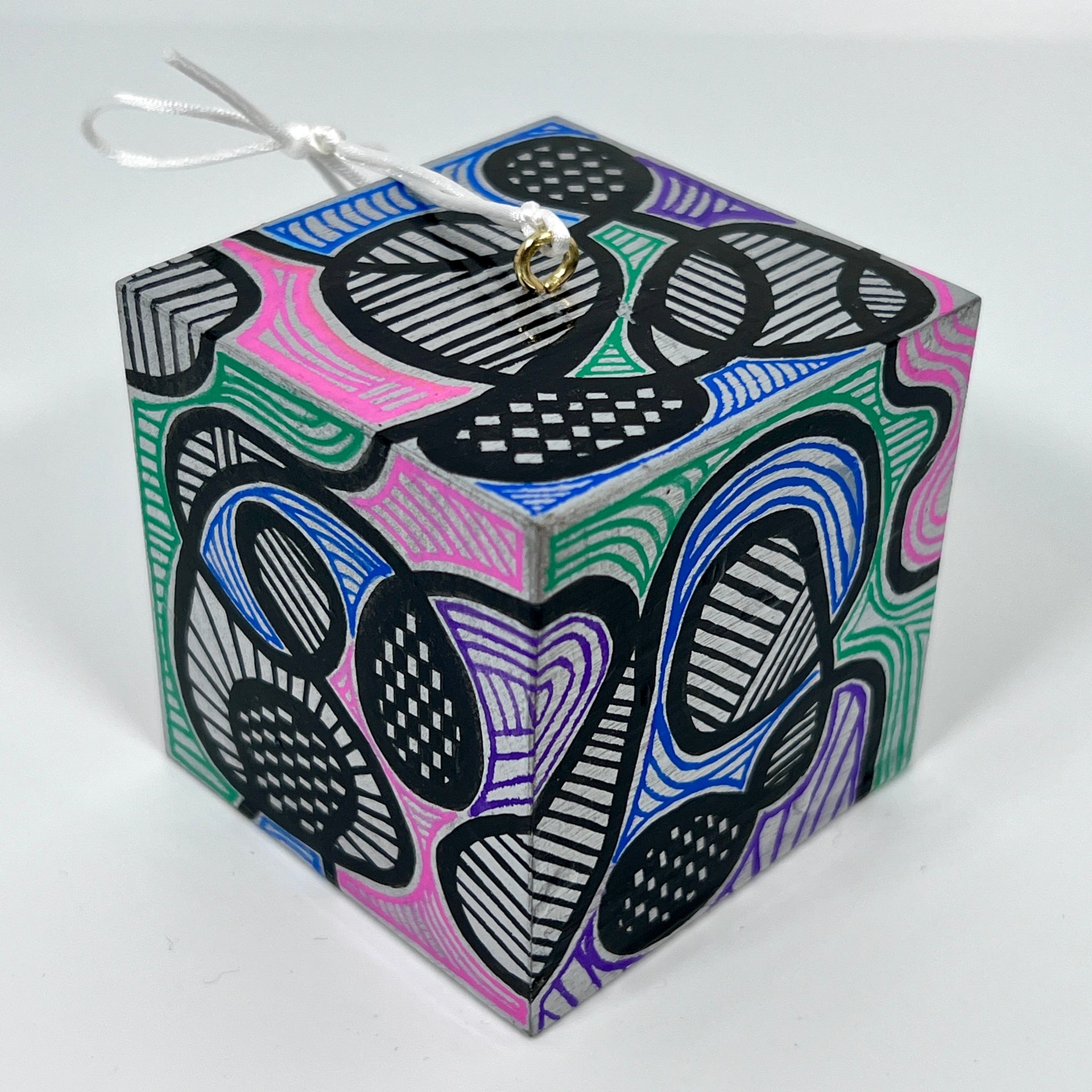 3-D CUBE ART #6 by Mary-Jo Lough, hand-painted 2.25” cube made from solid wood, featuring vibrant abstract art and layered details.