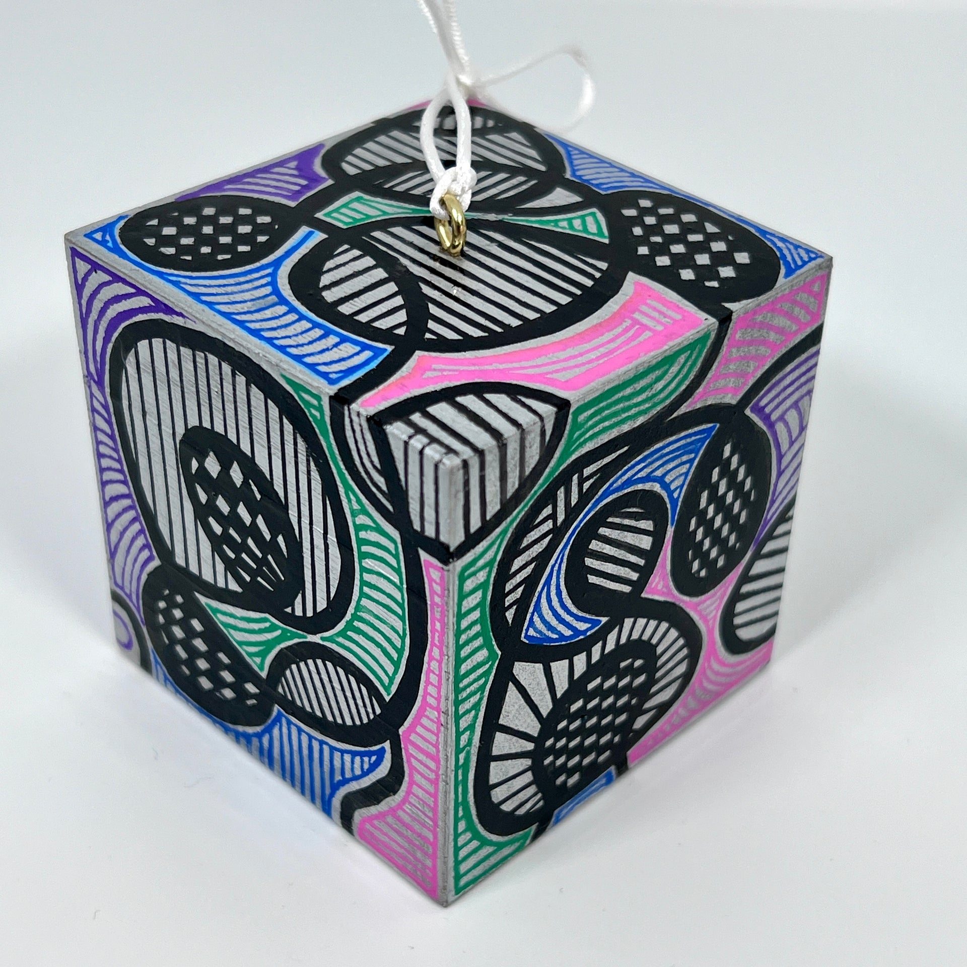 3-D CUBE ART #6 by Mary-Jo Lough, hand-painted 2.25” cube made from solid wood, featuring vibrant abstract art and layered details.