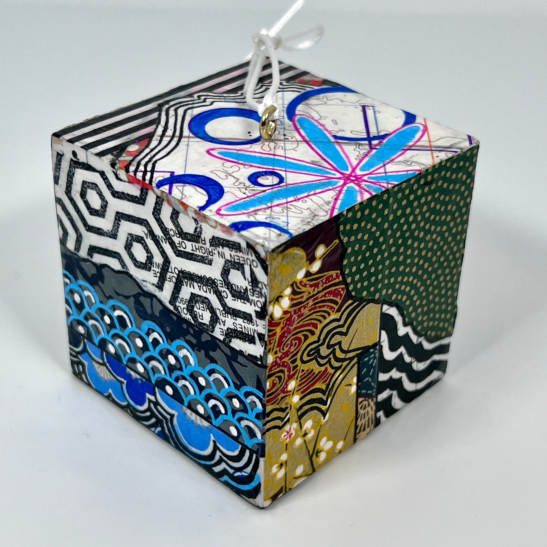 3-D CUBE ART #7 by Mary-Jo Lough, hand-painted 2.25” cube made from solid wood, featuring vibrant abstract art and layered details.